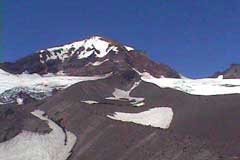 Looking up an ash and scree ridge at Middle Sister's East Face